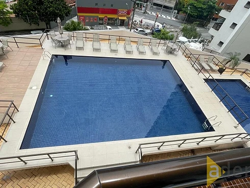 Apartamento Praia do Tombo com 215m², 3 Dormitórios, 2 Suítes, 2 Vagas Demarcadas, Piscina, Portaria 24h, Academia, Sauna, Churrasqueira e M - Foto 12