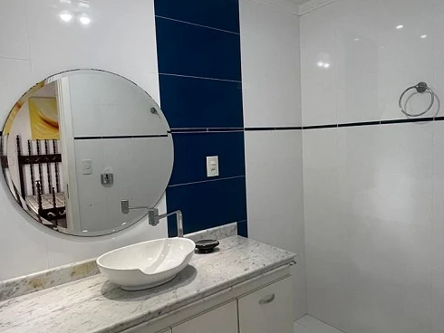Apartamento Praia do Tombo com 215m², 3 Dormitórios, 2 Suítes, 2 Vagas Demarcadas, Piscina, Portaria 24h, Academia, Sauna, Churrasqueira e M - Foto 28