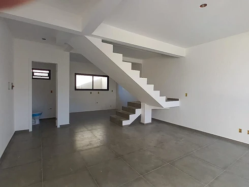 Sobrado geminado em Forquilhas, São José