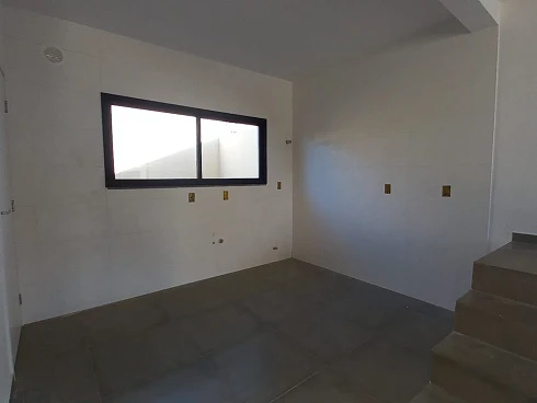 Sobrado geminado em Forquilhas, São José