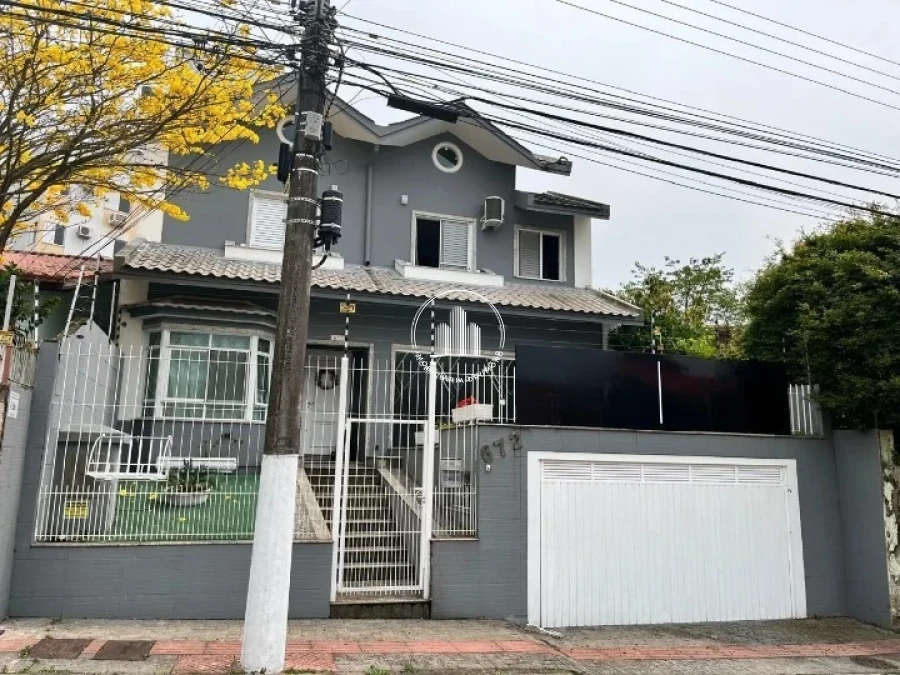 Casa em Estreito, Florianópolis. 4 quartos, 265m². Imagem 4 de 33