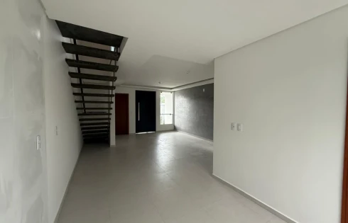 Sobrado geminado em Forquilhas, São José