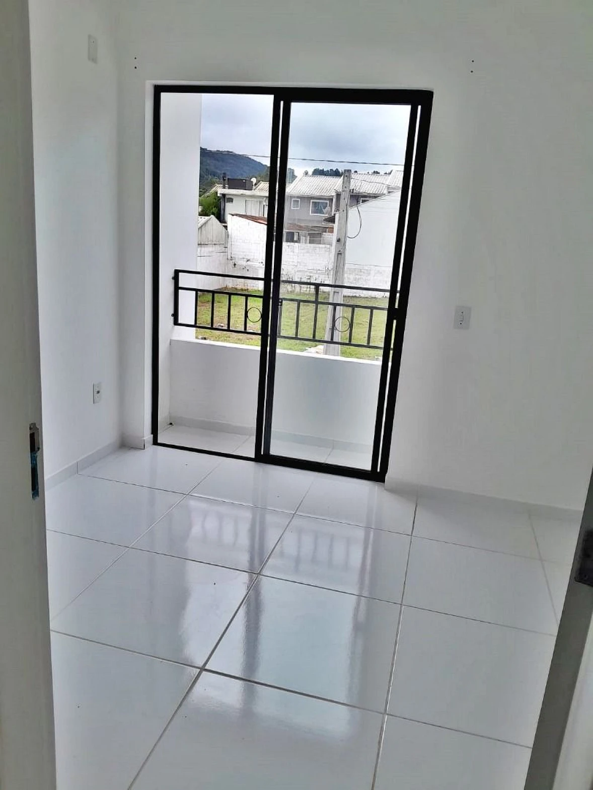 Sobrado geminado em Forquilhas, São José