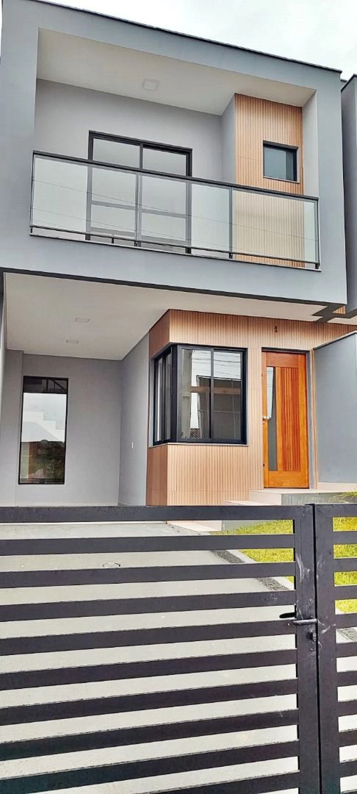 Sobrado geminado em Loteamento Jardins, Palhoça