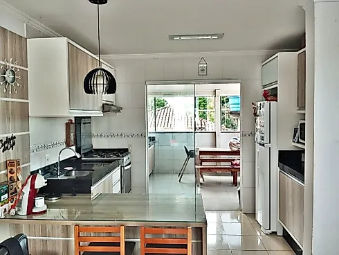 Sobrado geminado em Forquilhas, São José