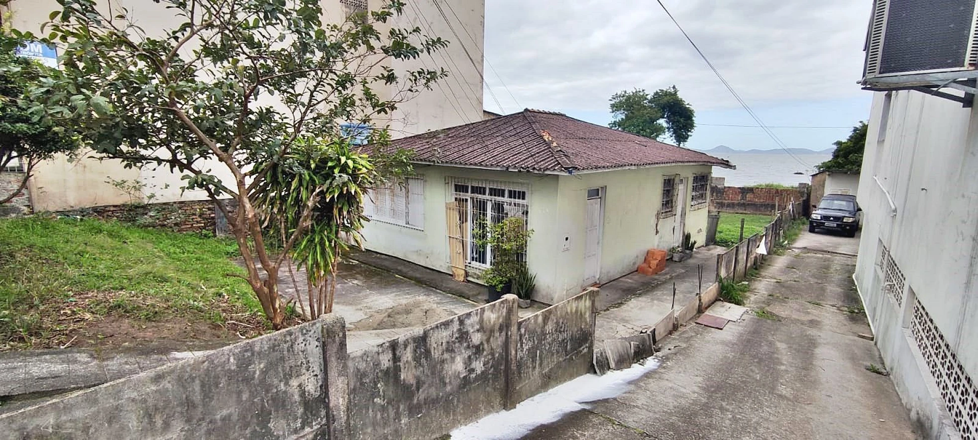 Ótimo Terreno de 450m em Barreiros com Casa - Foto 10