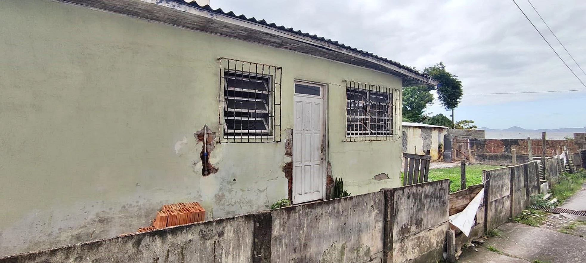 Ótimo Terreno de 450m em Barreiros com Casa - Foto 11