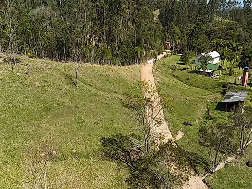 Área Rural de 7,8 Hectares com Pastagem, Reflorestamento e Recursos Hídricos – São Bonifácio/SC - Foto 4