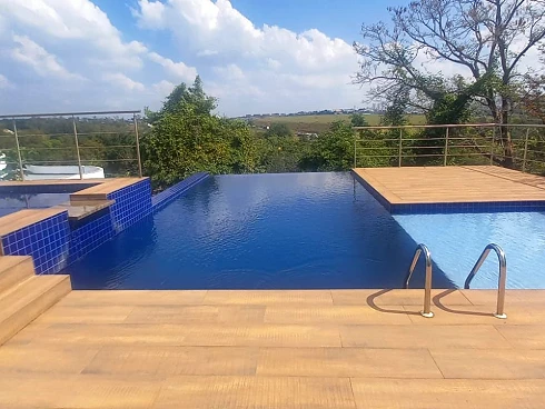 Casa dos Sonhos no Alphaville Campinas: 5 Suítes, Piscina Infinita e Design Impecável! - Foto 14