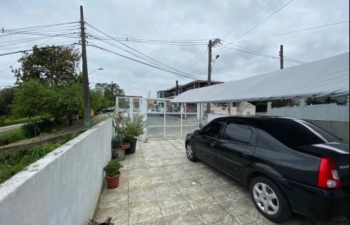 Sobrado geminado em Forquilhas, São José