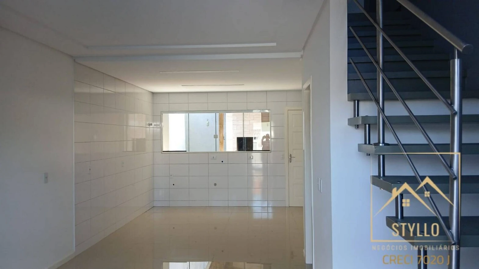 Sobrado geminado em Forquilhas, São José